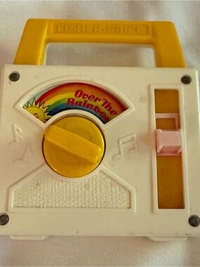 Fisher-Price Yellow and White Over The Rainbow Music Toy works